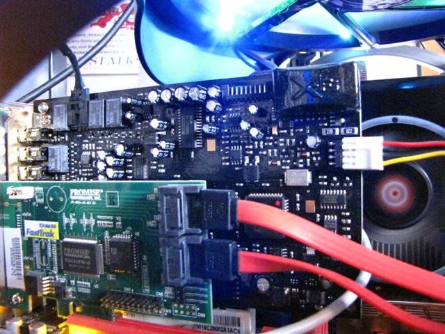 The black card is a Creative SB X-Fi Elite Pro, one of their top cards.